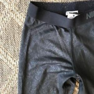 Black shiny snakeskin print leggings